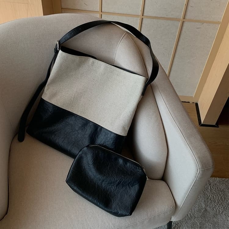 上質な革とキャンバス コンビサコッシュ